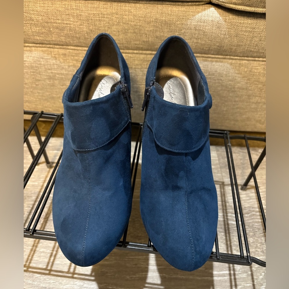Woman’s  Blue Suede Shoes
